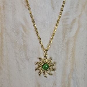 Gold Sun Pendant Necklace with Green Center